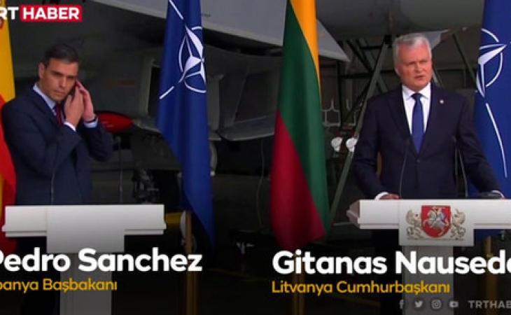 Rusiya hərbi təyyarəsi Litvanın hava məkanını pozdu: Prezident çıxışını yarıda kəsdi - VİDEO